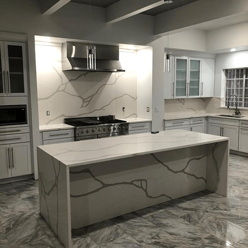Beautiful white kitchen granite in Tucson that matches the floor