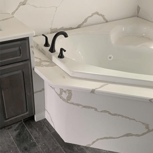White marble granite for bathroom tube that matches the wall's color